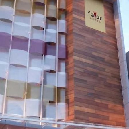 Favor Hotel Makassar City Center By Life Exterior photo